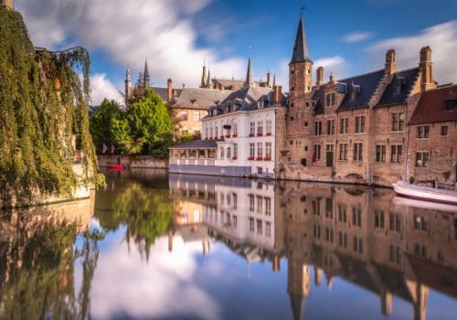 Long exposure Idyllic blurred Rozenhoedkaai at sunrise – Bruges medieval old town - Belgium